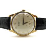 Record; A 9ct Gold Cased Gent's Wristwatch, the signed dial with Arabic numerals and seconds