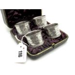 A Set of Four Hallmarked Silver Napkin Rings, Hilliard & Thomason, Birmingham 1895, each allover