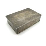 A Cigarette Type Box, of rectangular form, the flat hinged lid with engraved decoration,