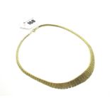 A 14ct Gold "Cleopatra" Graduated Fringe Necklace, stamped with Birmingham import mark to clasp