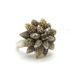 A Modern Diamond Set Cluster Dress Ring, of flowerhead design, set throughout with brilliant cut
