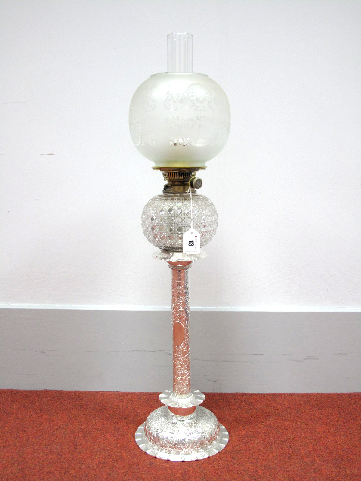 A Circa Early XX Century Hukin & Health Plated Oil Lamp, the circular base and column allover