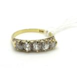 A Victorian Five Stone Diamond Ring, the graduated line of old cut diamonds claw set to a