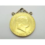 A George III Sovereign, 1817, applied pendant mount, polished.