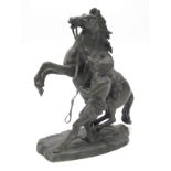 A Late XIX Century Bronze Marley Horse, after Guillaume Coustou, the rearing horse and figure upon a