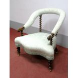 A XIX Century Walnut Bedroom Chair, with upholstered hooped top rail, scroll shaped arms, barley