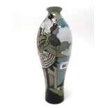 A Moorcroft Pottery Vase, of inverted baluster form, painted in the 'Kestrel pattern against a