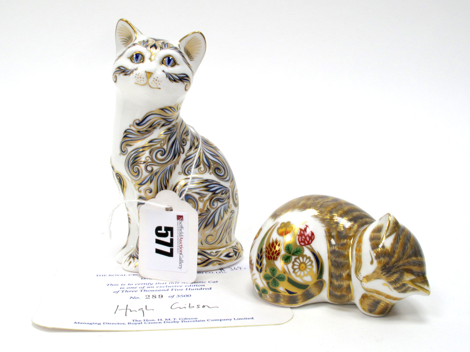 A Royal Crown Derby Porcelain Paperweight 'Majestic Cat', number 289 of a limited edition of 3500,