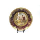 A Late XIX Century Vienna Style Porcelain Charger, the centre decorated with a classical scene '