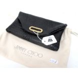 A Jimmy Choo Black Croc-Embossed Leather Clutch Bag, envelope style with gold tone magnetic snap