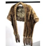 A Dark Beige Mink Stole, with collar and five tassles to each end,