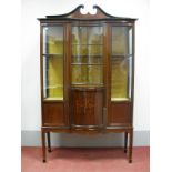 An Edwardian Mahogany Display Cabinet, with swan neck pediment, concave centre with astragal bars,