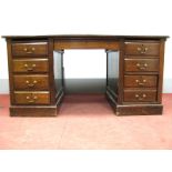 An Early XX Century Oak Pedestal Desk, with crossbanded top, brown leather sciver, central drawer,