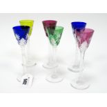 A Set of Six St Louis Harlequin Liqueur Glasses, the multi coloured flashed bowls with cut