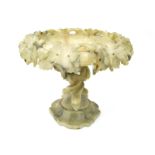 A Late XIX Century Alabaster Centrepiece Bowl, the circular bowl carved with fruiting vines and
