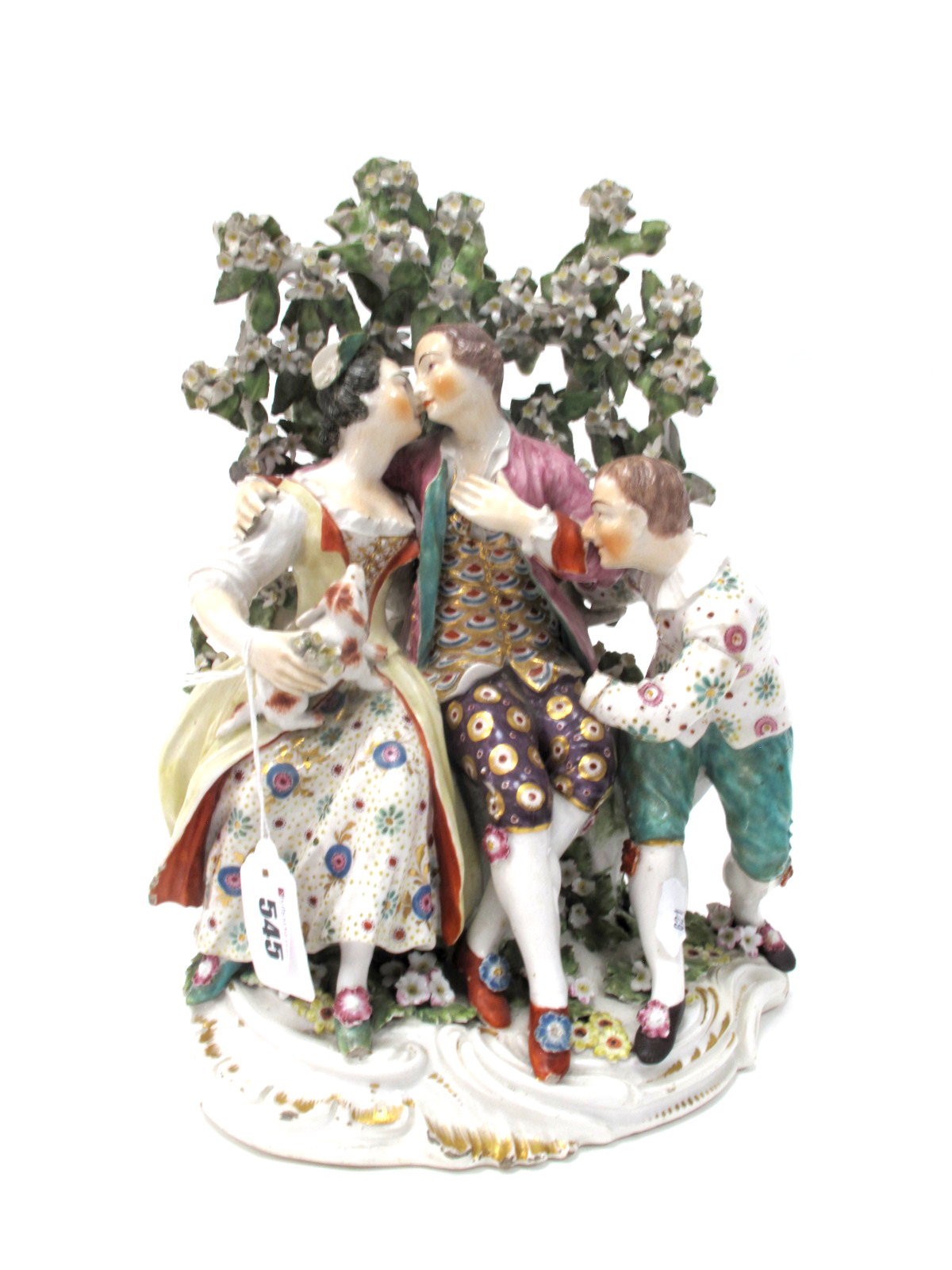 An XVIII Century Derby Porcelain Figure Group, modelled as a seated couple, holding a dog, another