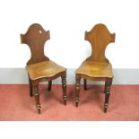 A Pair of XIX Century Mahogany Hall Chairs, with arched and shaped backs, serpentine seats with