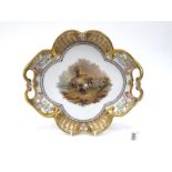 A Late XIX Century German Porcelain Two-Handled Dish, of oval form, the centre decorated with a