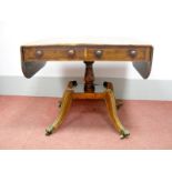 An Early XIX Century Yew Wood Sofa Table, with drop leaves, two single drawers and two dummy drawers