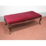 A XIX Century Simulated Rosewood Stool, the rectangular upholstered top with shaped and carved