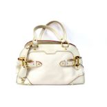 Louis Vuitton; A Suhali Le Radieux Handbag, in cream/white leather, with dual buckle embellishment