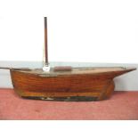 An Early to Mid XX Century Clinker Built Pond Yacht, with single mast, lead keel and fixed rudder,