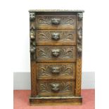 A Late XIX Century Oak Wellington Chest, with carved and moulded edge and five drawers, each with
