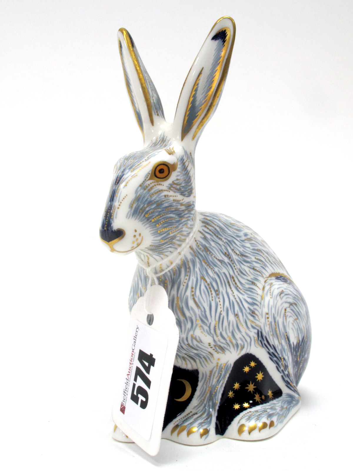 A Royal Crown Derby Porcelain Paperweight 'Starlight Hare', gold stopper, date code for 2003,