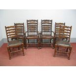 A Set of Six Reprodux Ladder Back Chairs, (four single and two carver), with drop-in seats, on