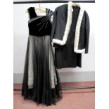 A 1950's Ball Gown, the black velvet bodice asymmetrically decorated with white beads and