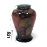 A Moorcroft Pottery Small Vase, of baluster form, painted in the 'Pomegranate' pattern against a
