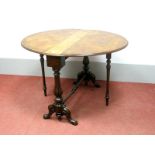 A XIX Century Walnut Sutherland Table, with moulded edge and drop-leaves, on turned and reeded