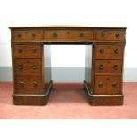 A Late XIX Century Walnut Pedestal Desk, with crossbanded top, three drawers, twin pedestals each