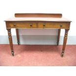 Heal & Son, London; A XIX Century Mahogany Side Table, the top with low back and moulded edge over