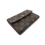 Louis Vuitton; Monogram Canvas Purse, bi-fold with stud fastener, 15.7cm wide.