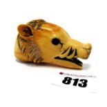 A Late XIX Century Ivory Walking Stick Handle, carved as a boar's head with open mouth, 7cm long.