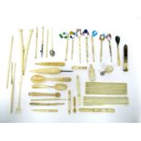 Seven Mid XIX Century Bone Lace Makers Bobbins, with attached glass beads, one inscribed "My Love,