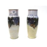 A Pair of Doulton Lambeth Stoneware Vases, of ovoid form, moulded and painted with bands of fruiting