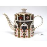 A Royal Crown Derby Porcelain Teapot and Cover, of lobed oval form, decorated in Imari pattern 1128,