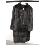 A Late XX Century Dark Brown Mink Coat, knee length, with the upper pelts vertical and lower pelts