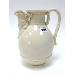 A Royal Worcester Porcelain Ewer, of ovoid form with basket weave moulded body and mask spout,