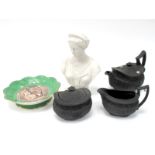 A Wedgwood Pottery Black Basalt Teapot and Cover, Sucrier and Milk Jug, each of part fluted form and