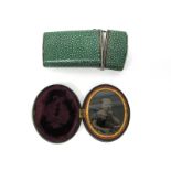 A Mid XIX Century Green Shagreen Etui, of tapered form, the hinged cover revealing a fitted interior