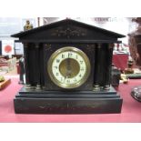 An Early XX Century Black Slate Mantel Clock, with Corinthian columns, Arabic numerals to cream