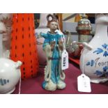 Chinese Pottery Figure of a Lady, in blue robes, 19cm high.