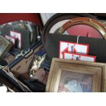 A Mid XX Century Oval Mirror, mid 50's Monopoly, circular wall mirror, gilt frame portrait study,