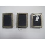 Three Modern Miniature Hallmarked Silver Mounted Rectangular Photograph Frames, each on easel