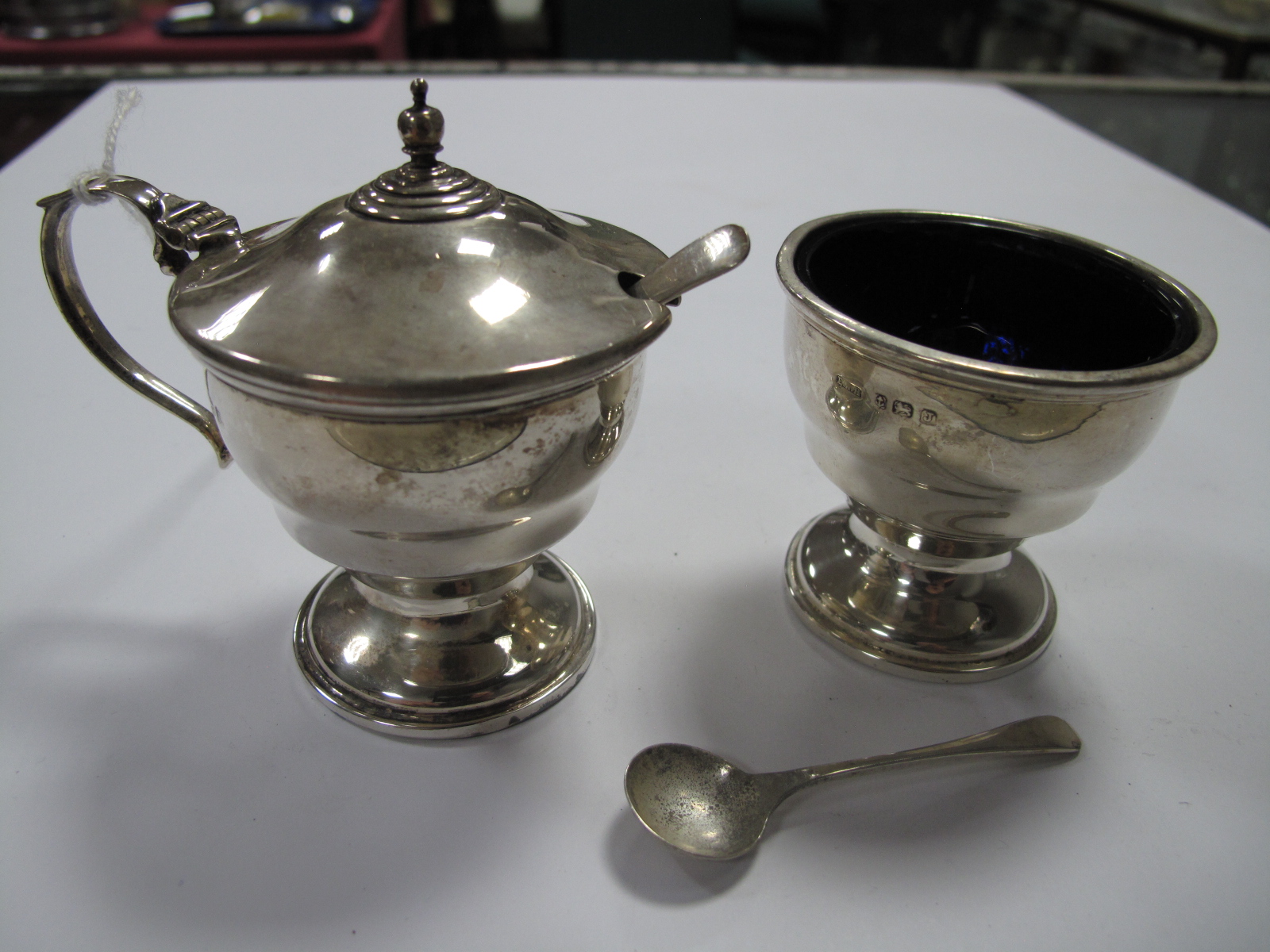 A Hallmarked Silver Lidded Mustard, of pedestal form with blue glass liner; together with matched