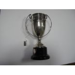 A Hallmarked Silver Twin Handled Trophy Cup, "Derby & District VW Club the James Trophy", on plastic