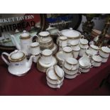 A Paragon 'Athena' Dinner, Tea and Coffee Service, (gold), comprising eight dinner plates, six